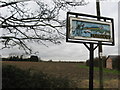 Pymoor village sign in CB6 2ED