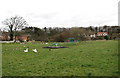 Village green and children's playground in NR27 9NX