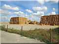 Stacking straw in early August in CB25 0BB