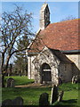 Porch and west end of St Peter's Church, Milden in CO3 5UN