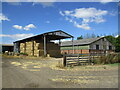 Farm buildings near Long Wood in LE15 9JY