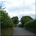 Pole by road to Stringston with overhead phone lines and  in TA5 1SS