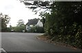 Old Farnham Lane at the junction of Frensham Road in GU10 3NZ