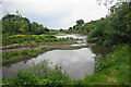 Spurn Clough joining the River Calder in BB12 9DS