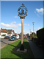 Rolvenden Village Sign in TN17 4NB