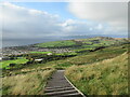 View of Largs and the Firth of Clyde from path below Cauld Rocks in KA30 8HD