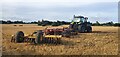 Farm machinery from Grange Farm in a recently ploughed field in CO16 9PX