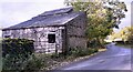 Barn on west side of rural road north of Hartley Fold in CA17 4JH