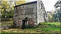 Stone barn beside rural road north of Hartley Fold in CA17 4JH