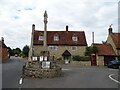 Village Cross and cottage in MK43 7QT