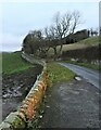 Retaining wall on the road past Dunearn in KY3 0AH