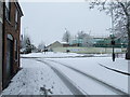 Parkway and Kings Road roundabout in the snow in IP33 3RR