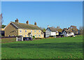 Eltisley: houses on The Green in Eltisley