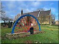 Colliery wheel in St Thomas's churchyard in S64 5SD