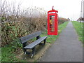 Bench and former telephone kiosk in DE55 5LW