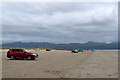 Cars on the beach at Black Rock Sands in LL49 9YE