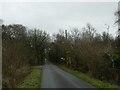 Signs for track crossing the road on edge of Broad Down in EX24 6DL