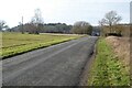 Country road crossing Broadmoor Common in HR1 4QU