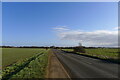 Helpston Road (B1443) leading to Glinton in PE6 7LA