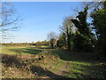 Public footpath into meadow near Banstead in SM7 3BH