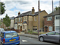 House with 'ghost' sign, Tachbrook Road in TW14 8SB