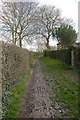 Rather muddy footpath from Cemetery Lane to Park Road, Denmead in PO7 6FY