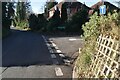 Westwell Lane, Sandyhurst Lane junction in TN25 4NS