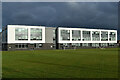 Stone Lodge School, against a very stormy sky in DA9 9BB