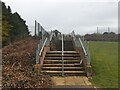 Broken steps to recreation ground in Andover Downlands Ward
