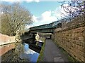 Railway bridge over the Ashton Canal in M34 5NG
