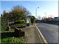 Bus stop and shelter on Roby Road (A5080) in L36 5UL