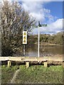 Direction and warning signs at path junction beside the River Wear in NE38 8LE