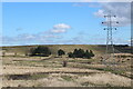 View across moorland to wall of reservoir in NP23 5DH