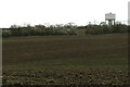 View across the fileds to the water tower in SG11 1DY