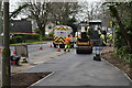 Pavement resurfacing beside Ringwood Road in BH22 8PP