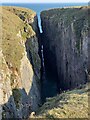 Deep fissure in the limestone cliff in SA71 5DR
