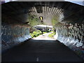 Cyclists passing under Filwood Road bridge in BS16 3UT