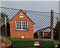 Telephone exchange behind a fence, Upton Bishop in HR9 7TX