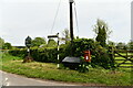 Worthing: Village sign and postbox in NR20 5HH