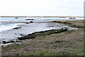 Bones of a boat on mud flats in CM0 8LU