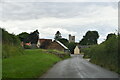 Newton Blossomville: Entering the village with St. Nicholas's Church visible in MK43 8AL