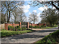 East past entrance to the Manor House in NR10 4NZ