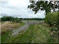 Footpath line approaching some double field gates in LU7 9DB