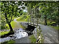 Footbridge and ford over a small stream in LA22 0JE