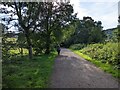 Looking west on The Sett Valley Way, old railway track path in SK22 1DL