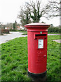 Pillar box on village green in Frettenham