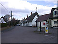 Pampisford High Street and village pump in CB22 3ET
