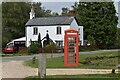 Former phone box and cottage by the pond at South Weirs in SO42 7UQ
