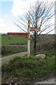 Signpost on the St Winnow road in PL22 0LF
