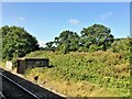 From a Swindon-Bristol train, lineside shed near Shockerwick in BA1 7LL